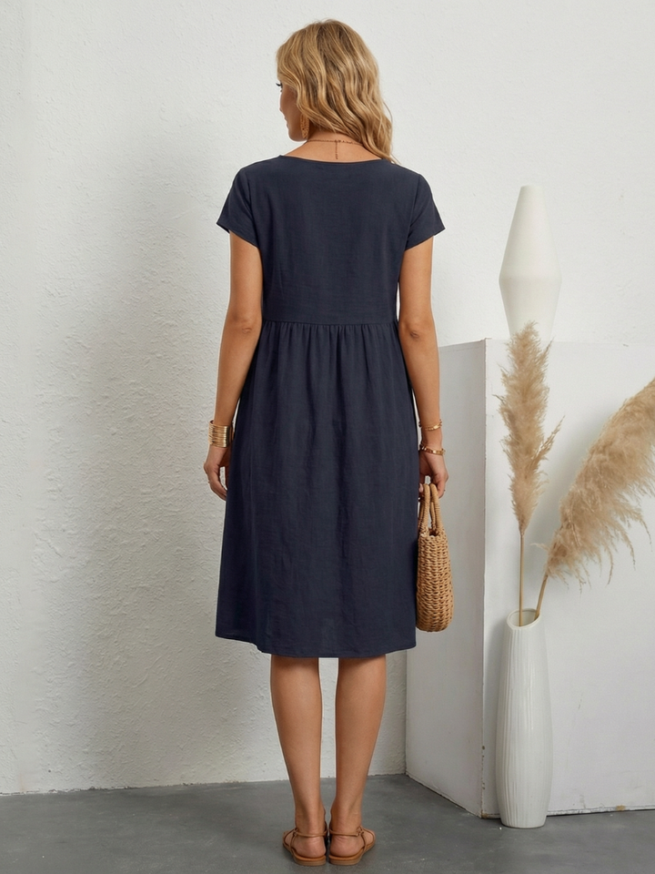 ELENI | ABITO CON TASCHE E COPRI-ADDOME ELEGANTE