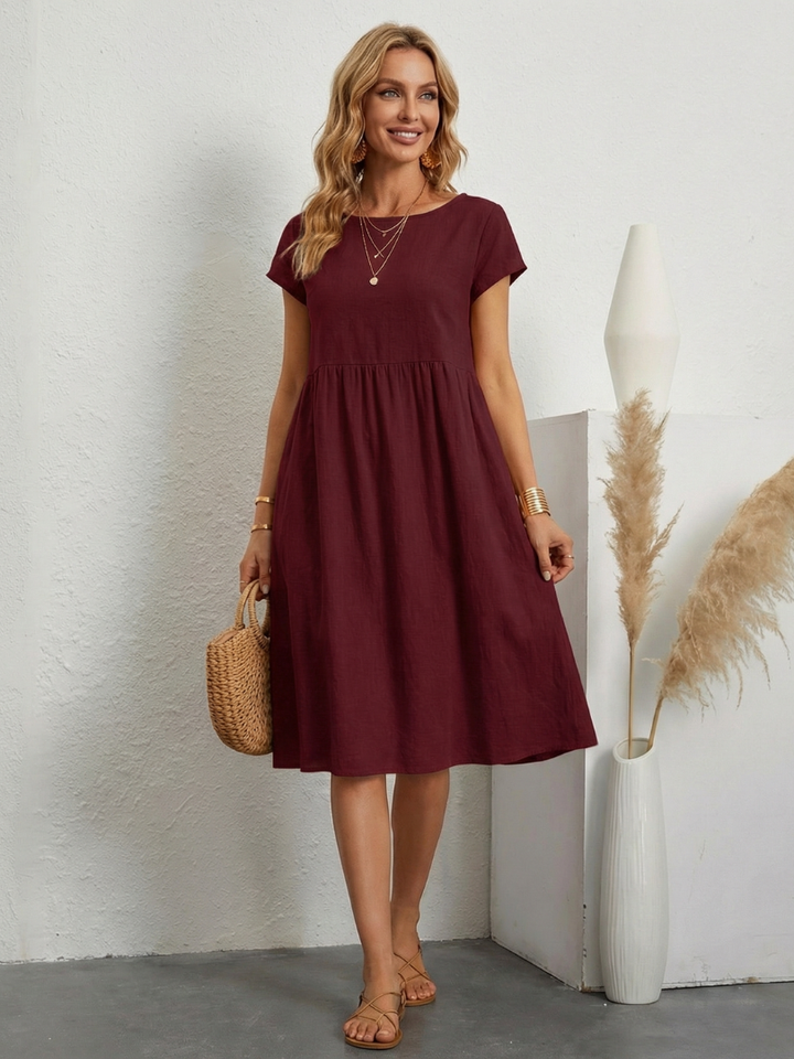 ELENI | ABITO CON TASCHE E COPRI-ADDOME ELEGANTE