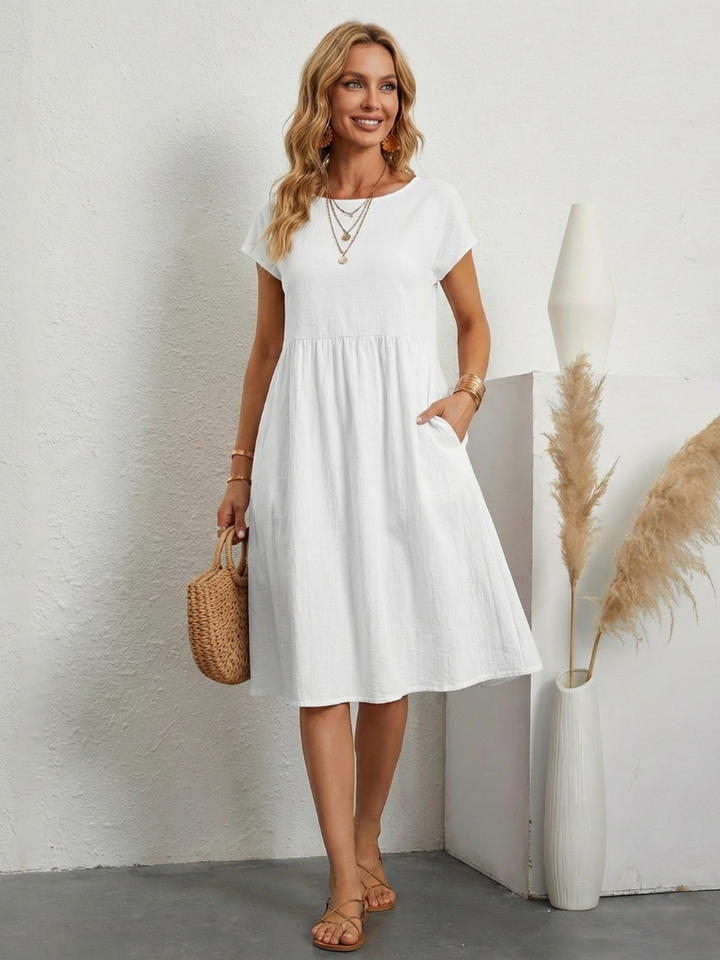 ELENI | ABITO CON TASCHE E COPRI-ADDOME ELEGANTE