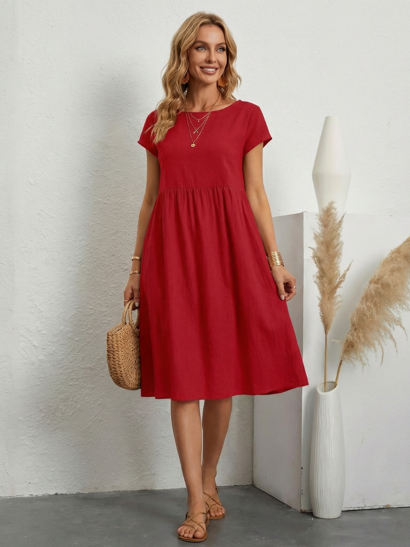 ELENI | ABITO CON TASCHE E COPRI-ADDOME ELEGANTE